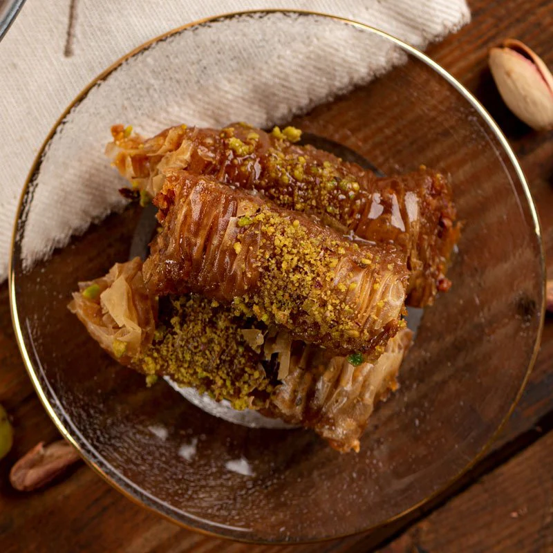 Traditional Greek Saragli – Rolled Baklava with Almonds (8 pieces – 250g) - Image 2