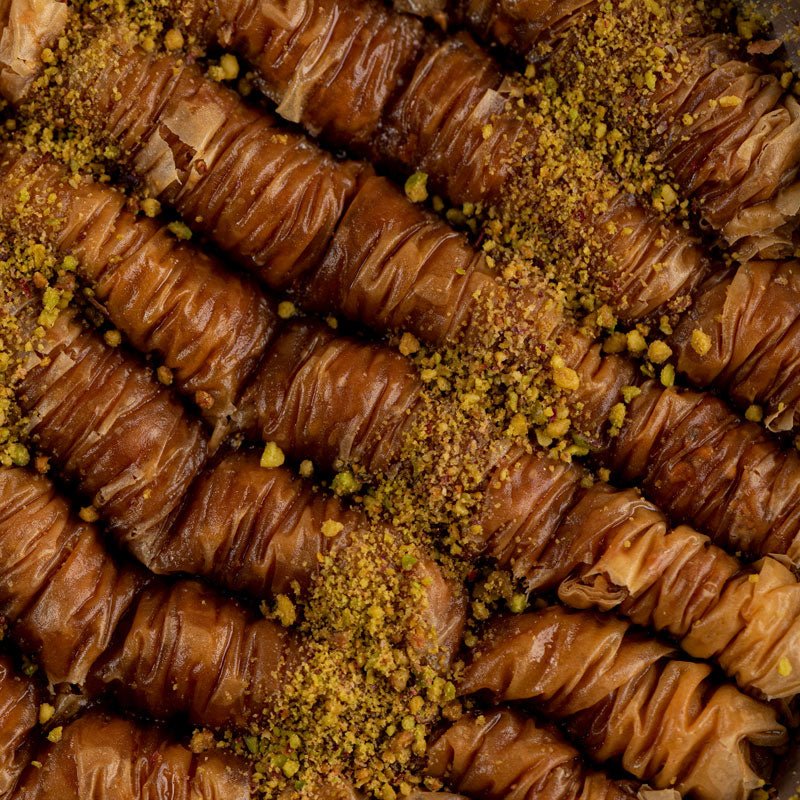 Traditional Greek Saragli – Rolled Baklava with Almonds (8 pieces – 250g) - Image 3